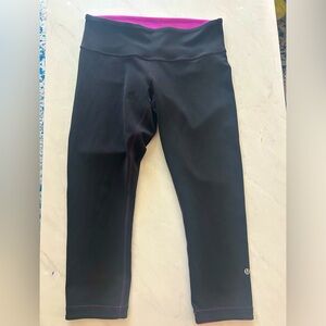 Lululemon Reversible 3/4 length Pink/Black Yoga Pants.